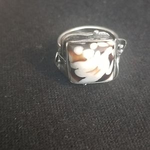 Peanut wood ring. Custom silver work.